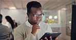 Businessman, tablet and thinking in office with research, ideas and problem solving for creative project. Designer, professional and networking with digital technology for planning or brainstorming