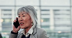 Walking, Asian and businesswoman in airport for phone call communication, travel booking or commute. Corporate, talking or mature lawyer in lobby with mobile for international trip or flight schedule
