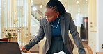Business woman, laptop and document for planning, task and schedule in office. Employee, HR manager and black person thinking with computer for project, proposal or research for report for review
