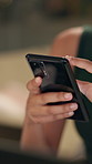 Business, typing and hands with phone scroll in office for email response, text message or online networking. Closeup, professional person or smartphone for research, communication and searching web
