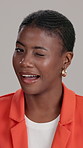 Black woman, face or wink in studio for business, good choice or secret with laughing. Corporate person, happy or satisfied on white background with fashion, positive feedback or opportunity in Kenya