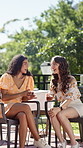 Friends, women and party with conversation in backyard for memory, drinks or new years event. People, summer and talk with smile, laugh or relax with alcohol at reunion for weekend celebration
