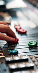 Hands, music and radio with sound engineer in recording studio closeup for audio production. Balance, creative and synthesizer with person at record label to produce project for industry talent