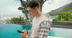 Happy man, smartphone and typing for connection, networking and online dating on social media. Male person, smile and mobile tech for communication, post and update on holiday or vacation for travel