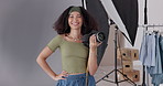Photographer, camera and face for media, magazine cover and photography in creative studio. Camera woman, smile and female person backstage for shooting, production and fashion director with lens