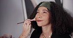 Woman, stylist hands or makeup for photography with brush, shoot or production in studio. Cosmetics, model or touch up on media agency set for preparation, process or behind the scene for videography