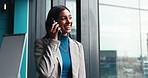 Happy, business woman and window with phone call for corporate discussion, conversation or chat at office. Female person, financial advisor or investor with smile or reflection on mobile smartphone