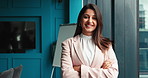 Businesswoman, face or banker in office with confidence, arms crossed or investment banking career. Portrait, smile or proud professional investor in financial company or corporate workplace in Dubai
