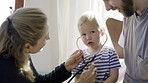 Father, baby and stethoscope of pediatrician for healthcare consultation, check lungs for breathing and heartbeat. Doctor, infant and assessment in clinic or hospital for medical analysis