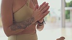 Praying, meditation and woman for yoga, wellness and peace or calm on floor with body zoom. Prayer hands, meditate and person for healing, spiritual faith and zen training, workout or lotus exercise 