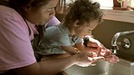Water, washing hands and mother with kid with soap for hygiene, child development and wellness. Family home, cleaning and happy mom teaching kid by sink for health, bacteria protection and germs
