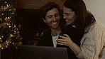 Christmas, laptop or happy couple typing to search for ecommerce social network in home together. Love, hug or man laughing, bonding or talking with woman on internet website for xmas online shopping