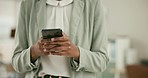 Happy black woman, phone and hands typing or walking at office in social media, communication or networking. Closeup of female person or employee texting or chatting on mobile smartphone at workplace