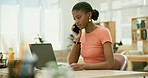 Phone call, computer and professional black woman in the office for communication on b2b deal. Technology, smile and African female designer on mobile conversation with laptop in modern workplace.