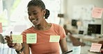Happy black woman, tablet and sticky note in schedule planning for tasks, agenda or calendar on glass board at office. African female person, employee or creative smile for strategy, ideas or startup