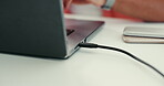 Hands, person and cable to charge laptop for database transmission, information security and it solution. Worker, port and digital app for software programming, online backup and maintenance transfer