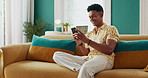 Happy man, phone and house sofa to relax on social media for rest or comfort on weekend break. Chill, technology and male person with smile on couch in home for calm peace and online dating on app
