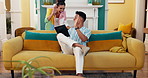 Happy couple, tablet and winning with high five on sofa for congratulations, promotion or celebration at home. Excited man, woman or lovers with smile on technology for good news or profit investment