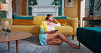Thinking, smile and relax with woman and phone for dating app, reflection and communication. Social media update, happiness and idea with person in living room at home for post, contact and chat