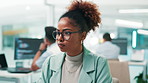 Woman, software developer or programming with computer for app development or coding at office desk. Female person, programmer or coder with glasses or technology for UI, UX or AI design at workplace