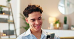 Phone, relax and social media with man on sofa in living room of home for browsing dating app profiles. Contact, smile or text message with happy person in apartment for mobile or online chatting