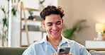 Phone, relax and smile of man on sofa in living room of home for browsing dating app profiles. Contact, social media or text message with happy person in apartment for mobile or online chatting