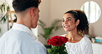 Flowers, romance or surprise with couple in home together for anniversary or valentines day. Hug, smile and thank you with man giving bouquet to woman in apartment for celebration, gift or love