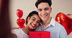 Happy couple, face and valentines day with selfie or gift for romance, holiday or love at home. Portrait, man and woman with smile for photography, picture or memory of romantic day or relationship