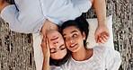 Love, couple and talking on floor in home with connection, affection and bonding together on pillow. Top view, people and relax with conversation for support, romance and commitment in relationship