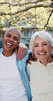 Nature, happy and face of senior friends hug in park for outdoor exercise with fresh air. Group, embracing and portrait of elderly people in retirement in field for workout with mobility increase.