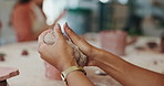 Pottery, clay and hands of person in studio, workshop or shape process for handmade design. Craft, hobby and artist with ceramic art, unique artwork or creative class for sustainable learning project
