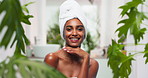 Plants, skincare and face of woman in home with natural, beauty and cosmetic morning routine. Organic, happy and portrait of female person with moisturizing facial treatment in bathroom with greenery