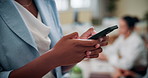 Hands, smartphone and business woman typing in meeting, scroll and project manager planning on internet. Technology, office and worker closeup on app for communication online, development or research