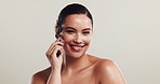 Skincare, face and jade roller with woman in studio for lymphatic drainage, circulation detox or beauty glow. Collagen stimulation, wellness and facial massage with person on white background for spa