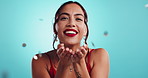 Confetti, smile and face of woman in studio for casino winner, gambling celebration and jackpot success. Las vegas achievement, excited and competition with person on blue background for luxury