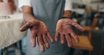 Dirty, hands and pottery with man in workshop closeup for art, crafts or creative hobby. Mud, palms and terracotta with master potter or sculptor in studio for professional craftsmanship process