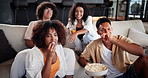 Popcorn, relax and group of friends with television in home for chill, entertainment or bonding on weekend. Movie, laugh and people watching film online together with snacks on sofa in living room.