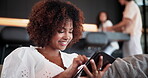 Woman, tablet and relax on sofa with social media, online shopping platform and browsing website. Girl, happy and scroll on tech in house share for ecommerce deals, connectivity and communication
