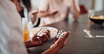 People, hands and domino game in home with relax, bonding or snacks for social. Friends, block puzzle and gathering in lounge for entertainment, weekend chill or strategy in competitive party pastime