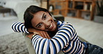 Face, home and woman on couch, relax and happiness with weekend break, comfort and chilling. Portrait, apartment and person on sofa, daydreaming and resting in living room, mindfulness and positivity