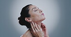 Glow, beauty and skincare with face of woman for dermatology, anti aging and collagen production. Spa, wrinkle treatment and self care with mature person on studio background for shine and cosmetics
