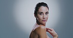 Face, skincare and mature woman in studio for wellness, beauty and facial treatment for anti aging. Dermatology, gray background and portrait of person for cosmetics, collagen and spa transformation