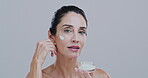 Beauty, face and cream with mature woman in studio for anti aging, wrinkles treatment and collagen production. Dermatology, hydration and lotion with person on white background for cosmetics