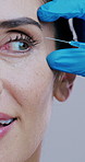 Woman, face or needle in studio for plastic surgery, collagen implant or antiaging treatment. Closeup, mature person or surgeon hand on white background for dermal filler, injection or transformation