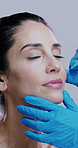 Skincare, hands and face of woman with syringe for dermal injection, cosmetic filler or facial change. Professional, beauty or gloves for collagen implant or anti aging treatment on studio background