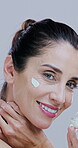 Cosmetics skincare, woman and face with cream for skin hydration, wrinkle reduction and hyaluronic acid. Mature person, moisturizer and beauty product application for self care on studio background