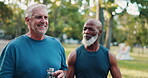 Nature, senior friends and fitness with water for hydration, wellness and talking on exercise walk. Park, men and conversation with h2o bottle for thirst, support and workout outdoor in retirement