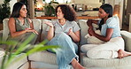 Home, friends and women with conversation for bonding, connection and chilling together on weekend. House, people and visit on sofa for talking, relax and advice for relationship drama in living room