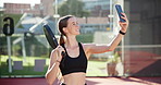 Happy girl, tennis player or picture with selfie or racket for photography, game or match on court. Female person, athlete or competitor with smile for fitness, memory or online post at sports ground