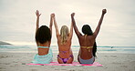 Back, women and holding hands on beach for freedom, travel and sisterhood with love. Friends, arms up and excited on California ocean with solidarity, summer vacation and bonding on holiday reunion